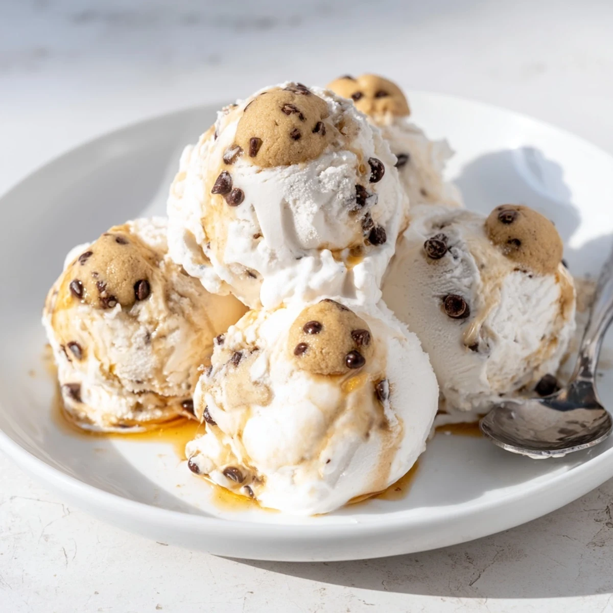 Creamy cottage cheese ice cream with cookie dough bites, a deliciously healthy dessert.  