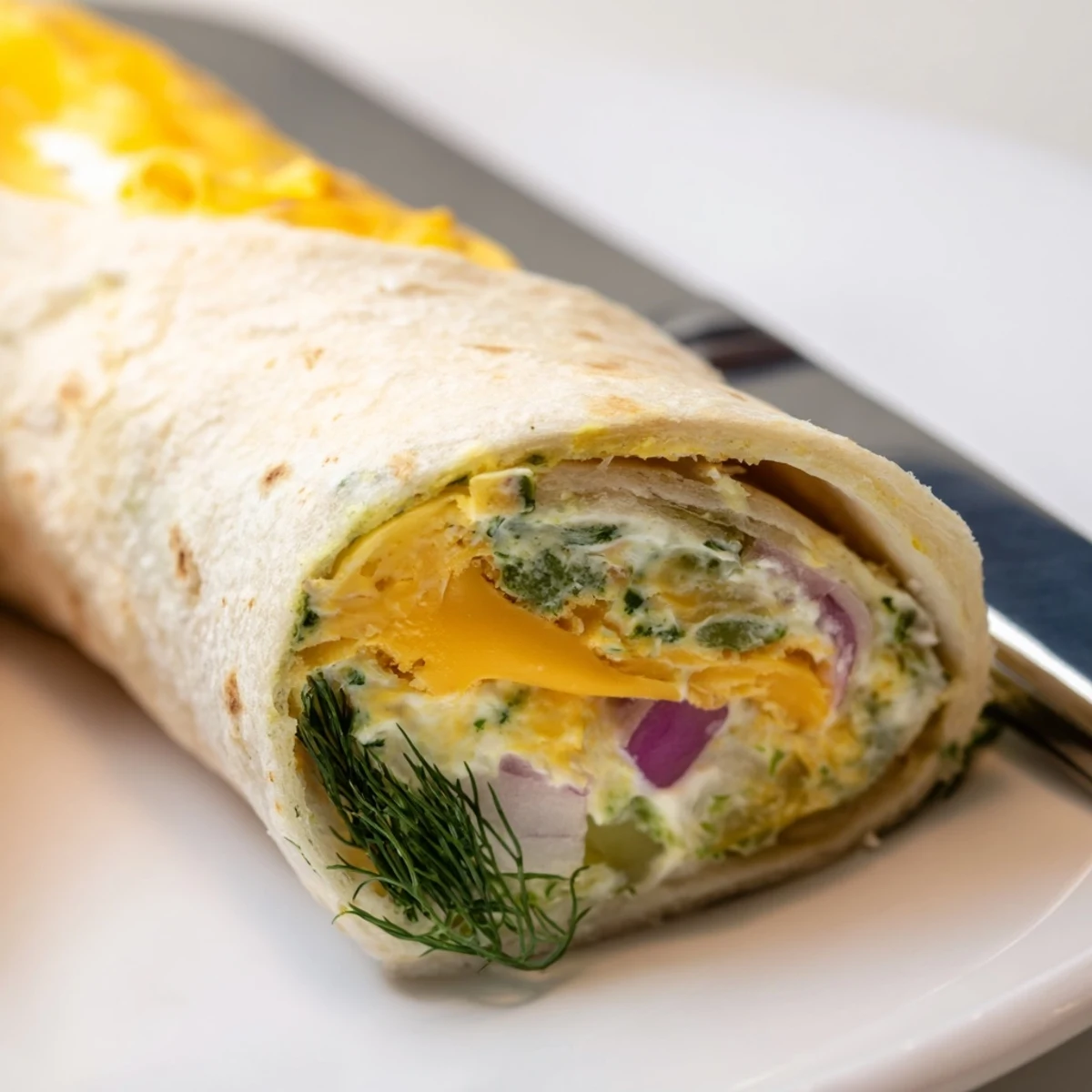 Deliciously cheesy Pickle-in-a-Blanket bites, perfect for snacks or parties.