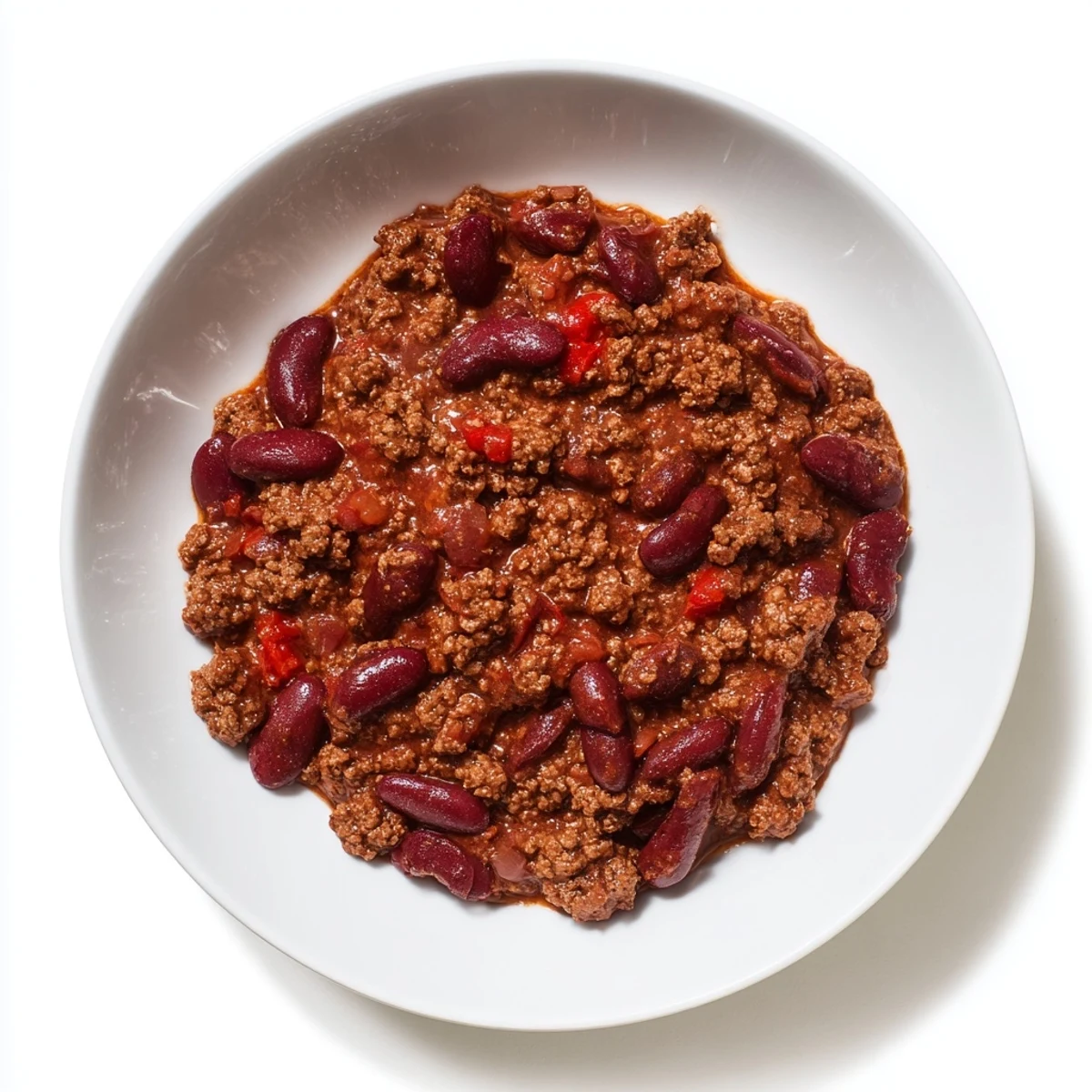 Steaming bowl of The Secret 4-Ingredient Slow Cooker Chili Dump, a flavorful and simple family meal.