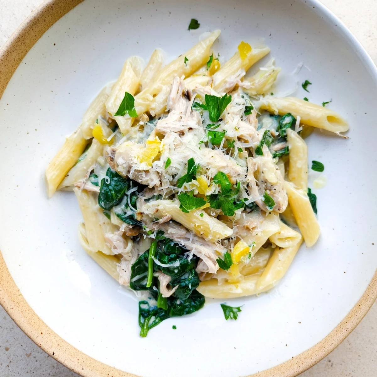 Golden-brown One-Pot Creamy Spinach & Turkey Christmas Pasta, ready on a festive holiday table.