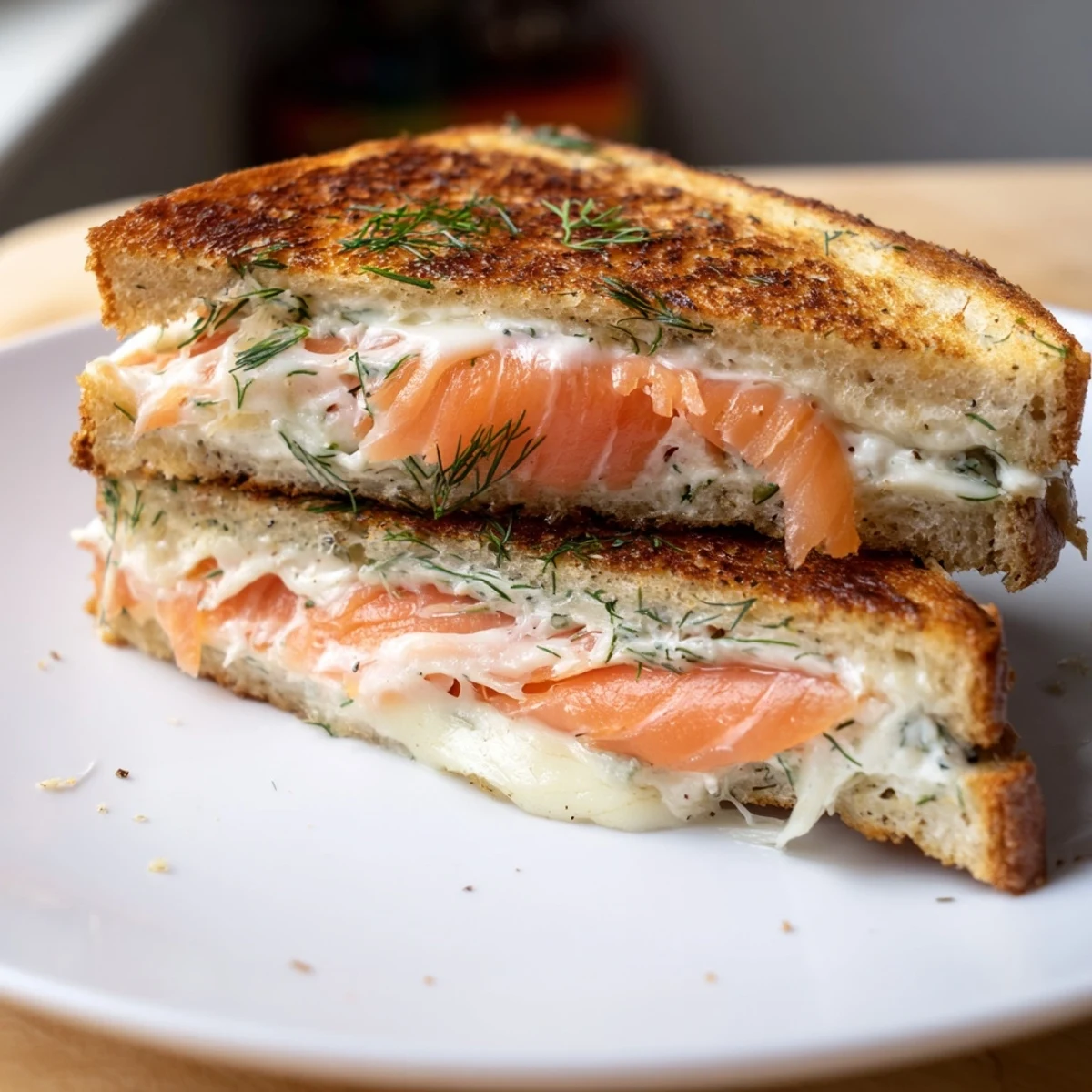 Golden, crispy Smoked Salmon Grilled Cheese oozes melted cheese and flaky salmon inside toasty bread.