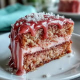Showcases a decadent Bridal Shower Rosé Velvet Cake, frosted generously, ready to celebrate.