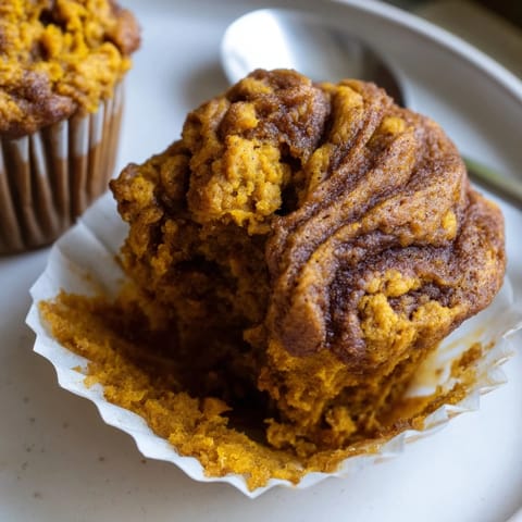A delicious batch of gingerbread pumpkin muffin swirls, perfect for holiday mornings.  