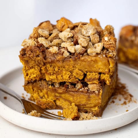 Autumn-inspired Coffee Crunch Pumpkin Pie Blondies with spiced pumpkin layers for a seasonal treat.  