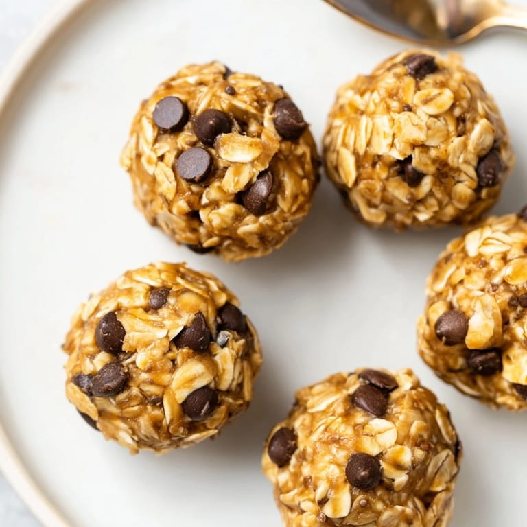 Colorful No-Bake Energy Bites on a plate, ideal for healthy, on-the-go munching.